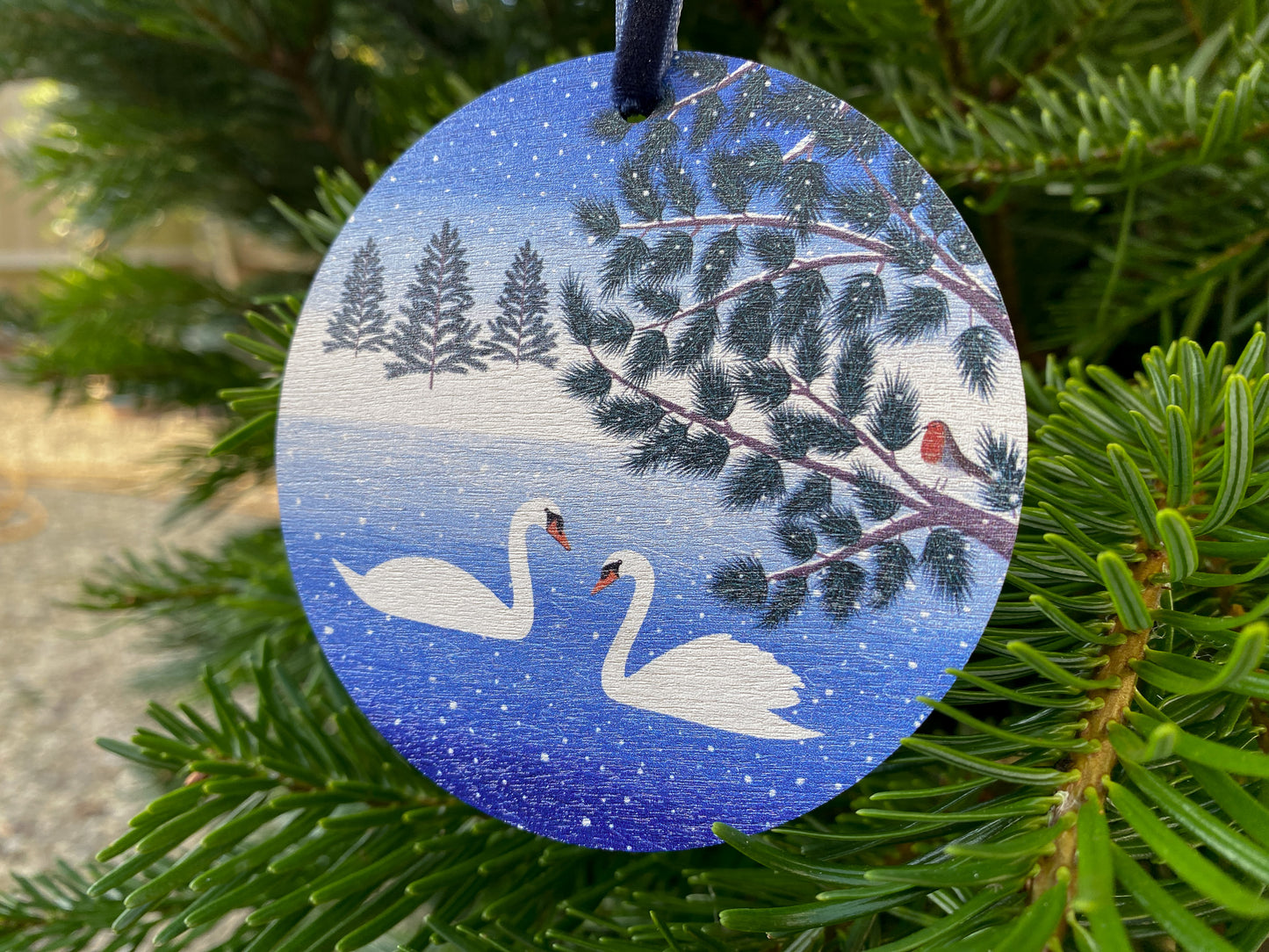 Swans and robin wooden decoration
