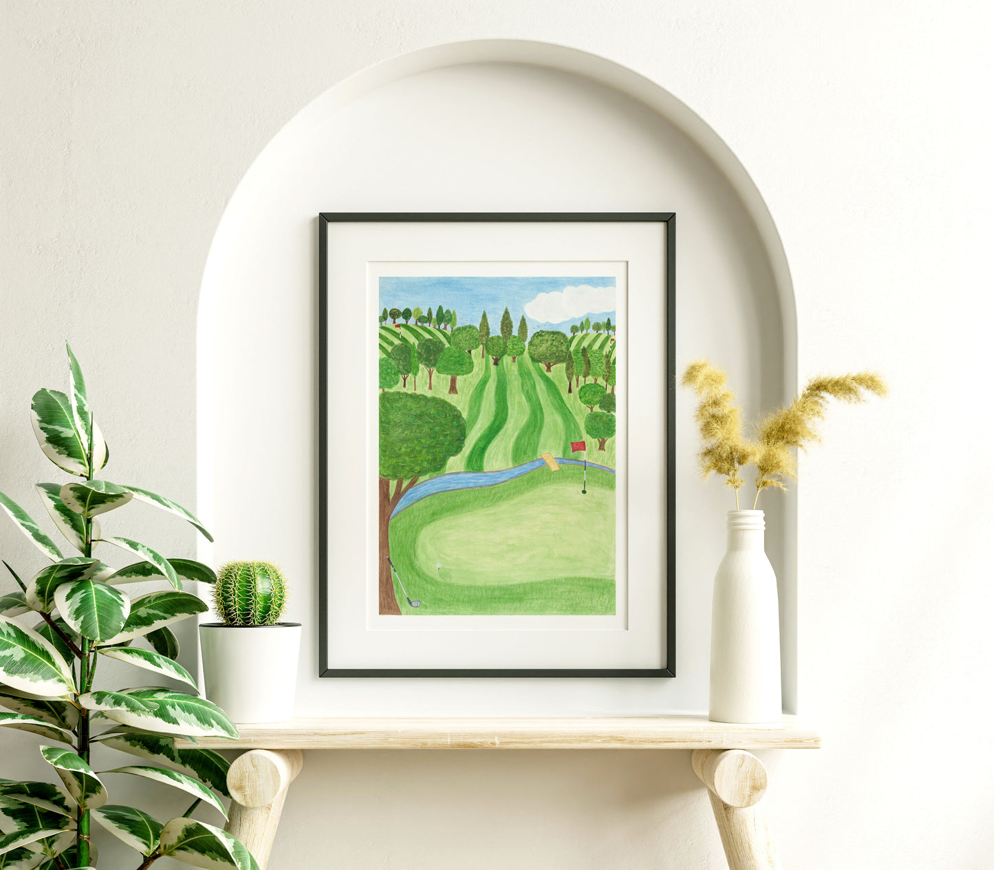 Golf art print. Golf course scene with stripy green fields and trees. Big green tree in the foreground. Blue river across the field. Hand painted with watercolours.